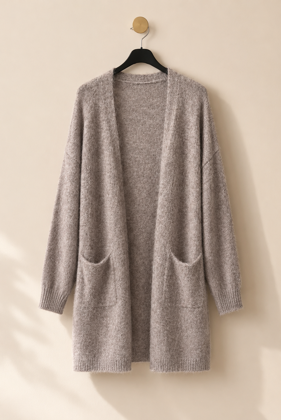 Lång stickad kofta med fickor – Mirelle Design