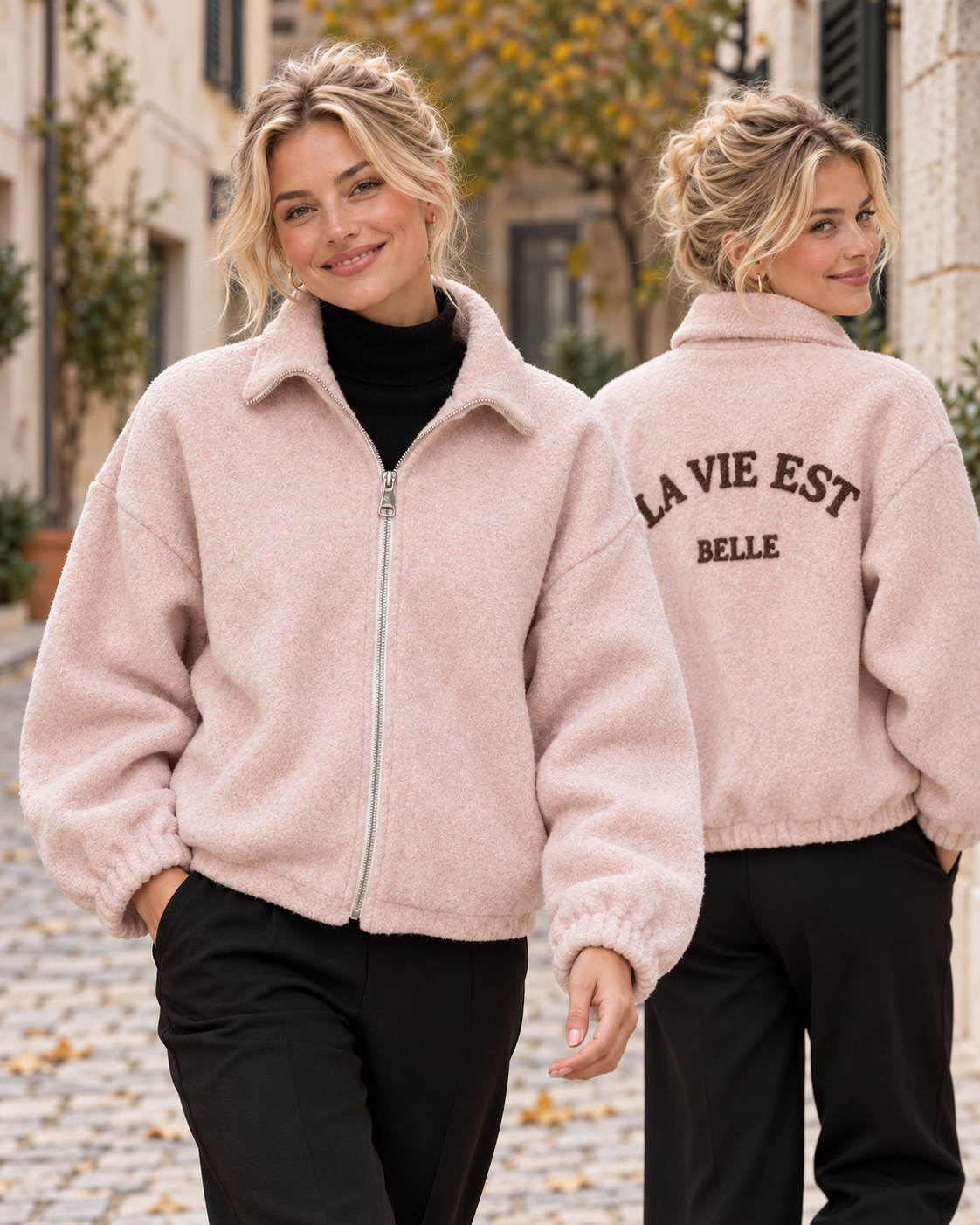 Rosa jacka La Vie med krage, rymlig passform och texten ”LA VIE EST BELLE” på ryggen