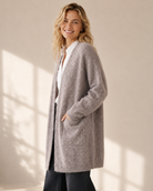 Lång stickad kofta med fickor – Mirelle Design