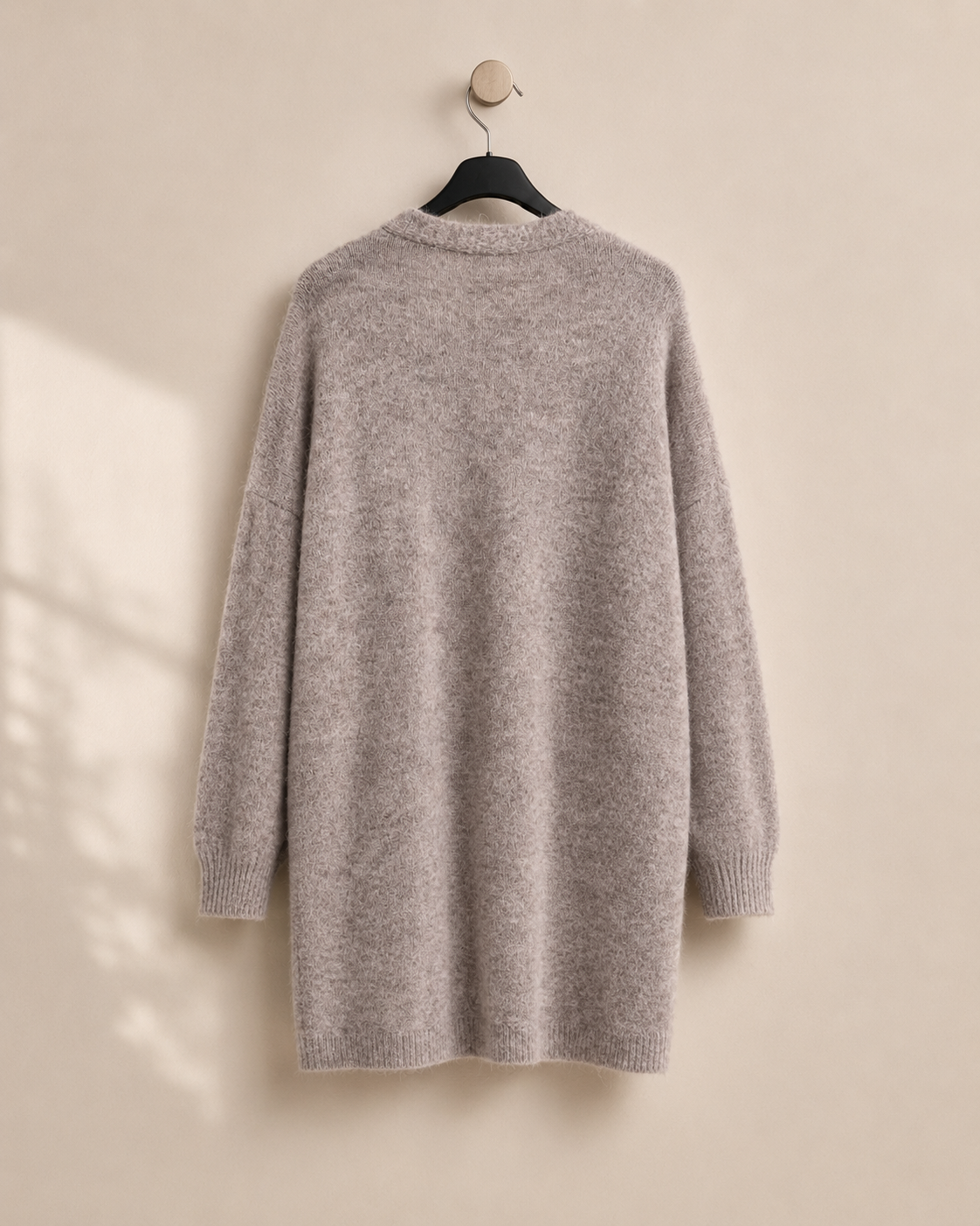 Lång stickad kofta med fickor – Mirelle Design