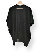 Stickad Poncho Maria svart - Dimoda