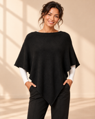 Finstickad svart poncho Gunsan i OneSize med asymmetrisk nederkant