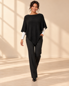Finstickad svart poncho Gunsan i OneSize med asymmetrisk nederkant